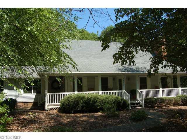 7600 Wallingford Road Greensboro, NC 27409 - Photo 1 of 14 Exterior Front. This farm house style has wonderful wrap around porch... low maintenance vinyl