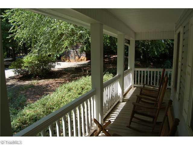7600 Wallingford Road Greensboro, NC 27409 - Photo 2 of 14 Exterior Front. Just can t get enough of the porch!