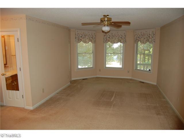 7600 Wallingford Road Greensboro, NC 27409 - Photo 12 of 14 Master Bedroom. The master is located on lst floor and features huge walk in closet