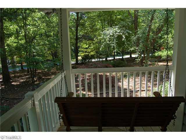 7600 Wallingford Road Greensboro, NC 27409 - Photo 14 of 14 Exterior Front. View from the Porch Swing!