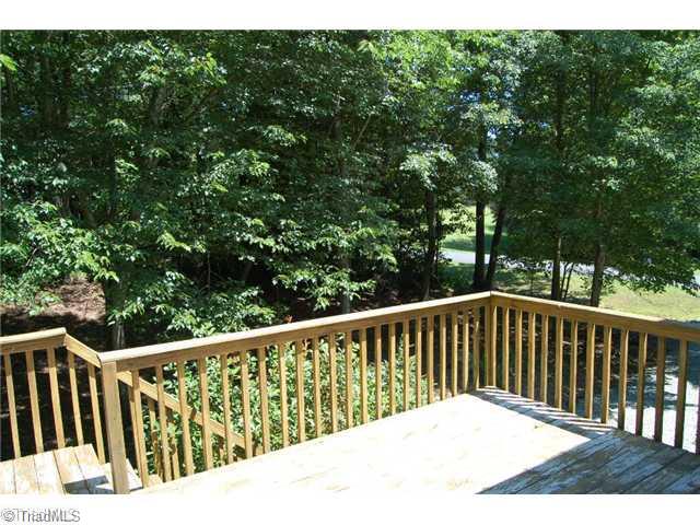 7600 Wallingford Road Greensboro, NC 27409 - Photo 4 of 14 Patio/Deck. Deck off back of house. access to 2nd driveway