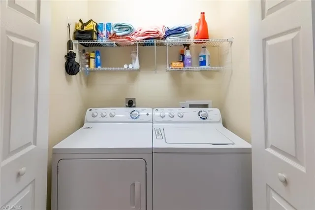 a utility room with dryer and washer