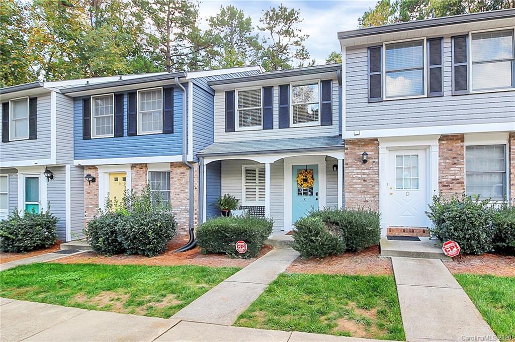1231 Scaleybark Road, Unit C Charlotte, NC 28209 - Photo 2 of 36 a front view of a house with garden and porch