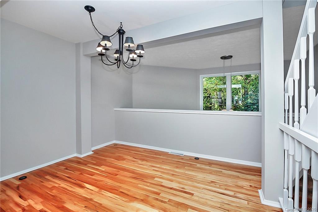 1231 Scaleybark Road, Unit C Charlotte, NC 28209 - Photo 12 of 36 a view of a chandelier in a room