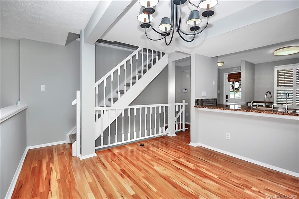 1231 Scaleybark Road, Unit C Charlotte, NC 28209 - Photo 14 of 36 a view of entryway and hall with wooden floor
