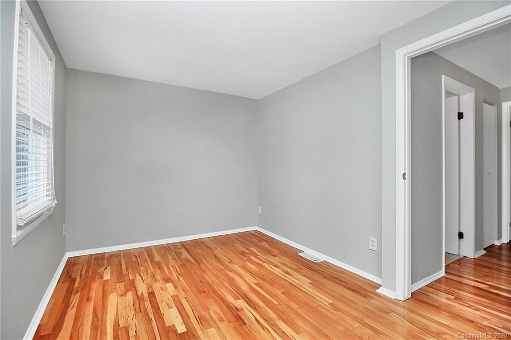 1231 Scaleybark Road, Unit C Charlotte, NC 28209 - Photo 25 of 36 a view of a room with wooden floor