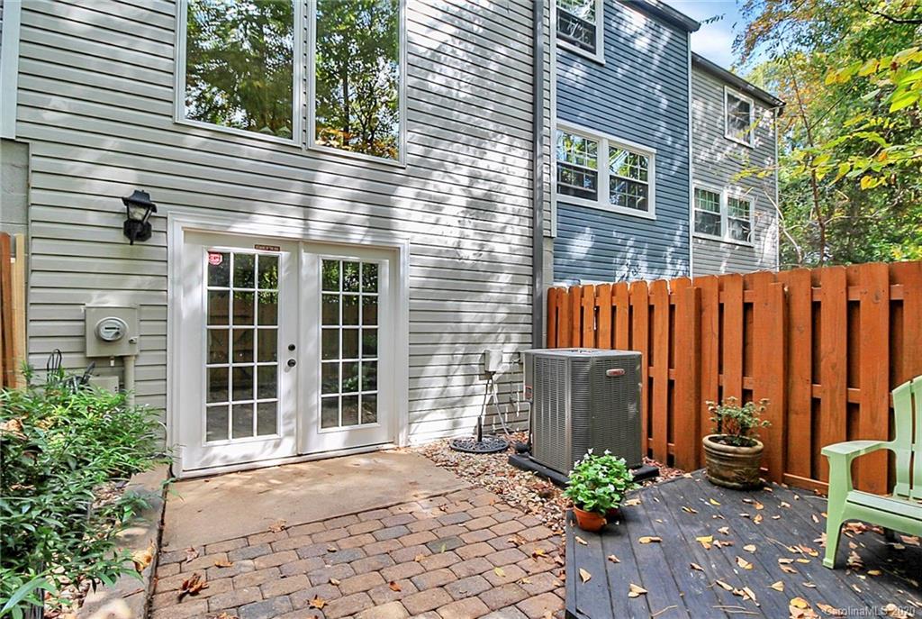 1231 Scaleybark Road, Unit C Charlotte, NC 28209 - Photo 35 of 36 a view of a house with backyard and sitting area