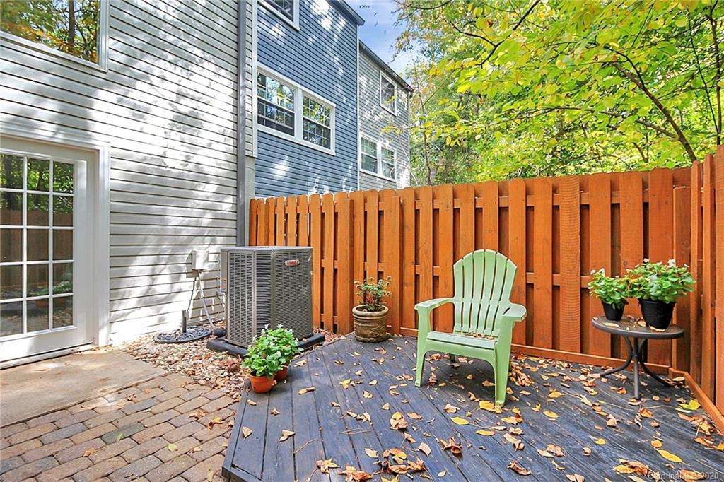 1231 Scaleybark Road, Unit C Charlotte, NC 28209 - Photo 36 of 36 a view of a house with backyard and sitting area