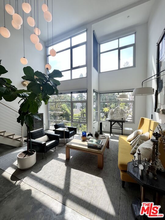 4111 Sunset Boulevard, Unit 332 Los Angeles, CA 90029 - Photo 4 of 17 a room with furniture and a large window