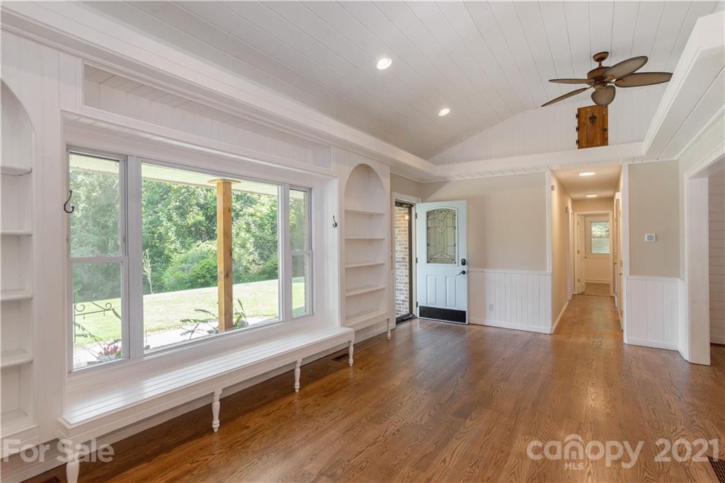 160 Cold Springs Road Hendersonville, NC 28792 - Photo 13 of 26 a view of empty room with wooden floor and fan