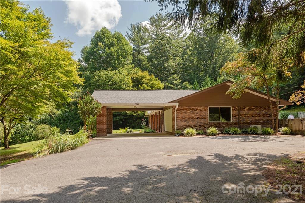 160 Cold Springs Road Hendersonville, NC 28792 - Photo 26 of 26 a front view of a house with a yard
