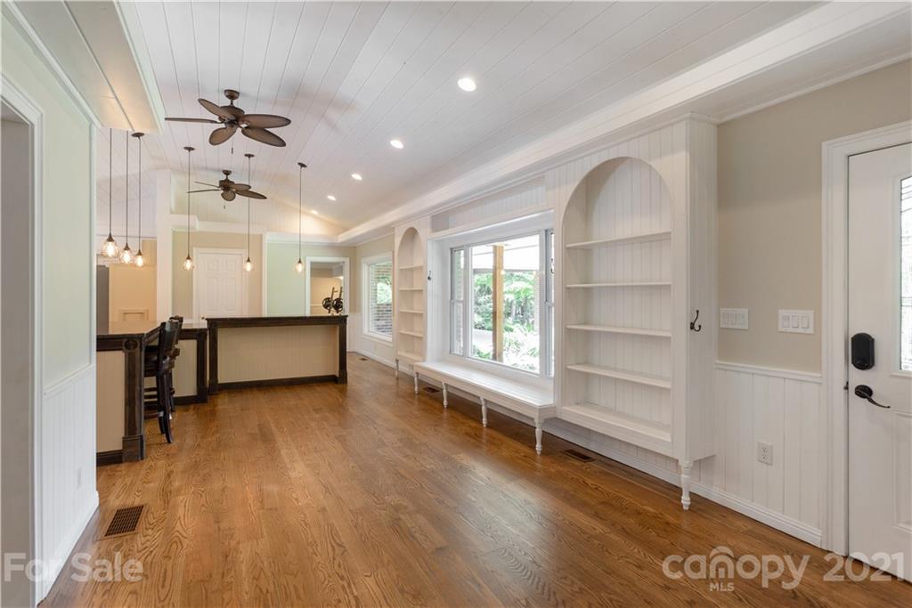 160 Cold Springs Road Hendersonville, NC 28792 - Photo 4 of 26 wooden floor in an empty room with a window