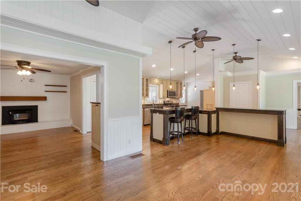 160 Cold Springs Road Hendersonville, NC 28792 - Photo 5 of 26 a view of kitchen with furniture and a fireplace