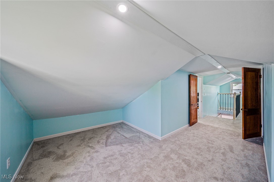 2716 Russell Road Ashtabula, OH 44004 - Photo 29 of 43 Bonus room featuring carpet flooring, lofted ceiling, and recessed lighting