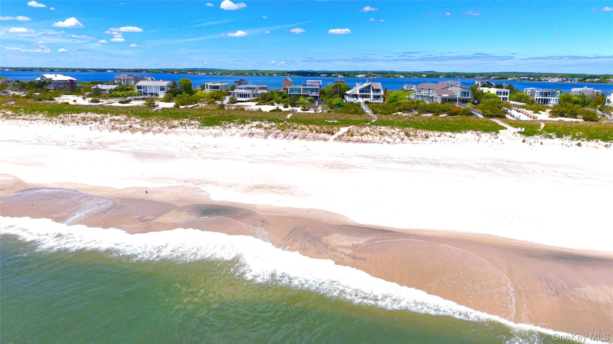 345 Dune Road Westhampton Beach, NY 11978 - Photo 34 of 34 Drone / aerial view of unending shoreline