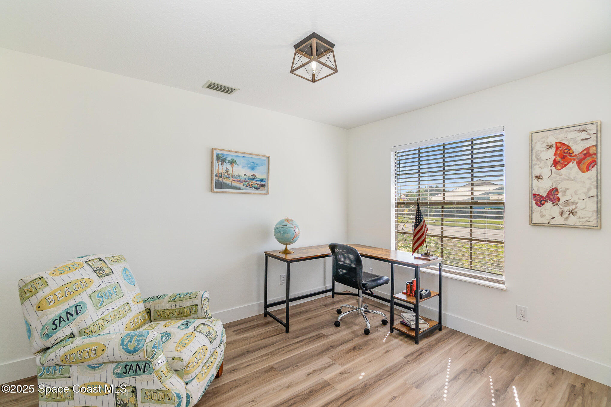 1905 Redwood Avenue Melbourne Beach, FL 32951 - Photo 8 of 15 a workspace with furniture and a window