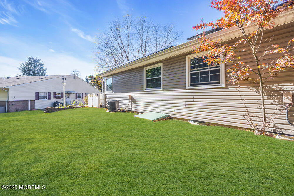 5B Spring Street, Unit B Whiting, NJ 08759 - Photo 31 of 39 a view of a house with a backyard