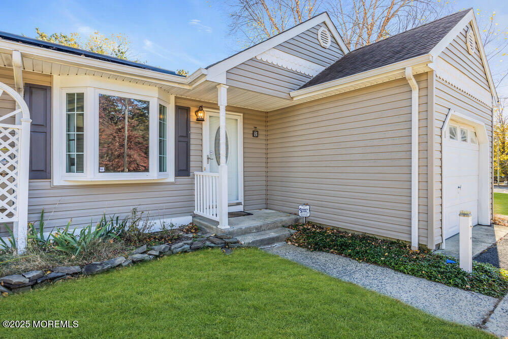 5B Spring Street, Unit B Whiting, NJ 08759 - Photo 5 of 39 a front view of a house with garden