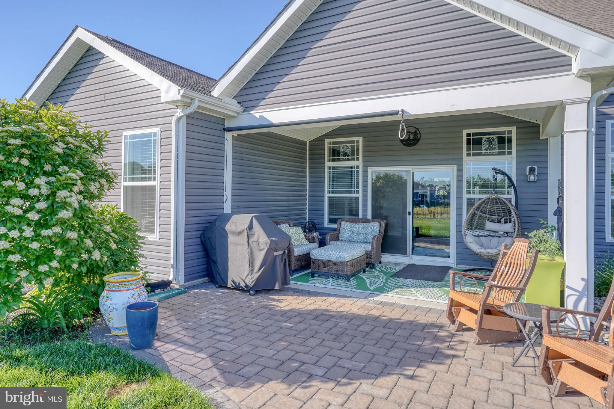 15272 Crape Myrtle Road Milton, DE 19968 - Photo 21 of 61 Charming patio for outdoor relaxation.