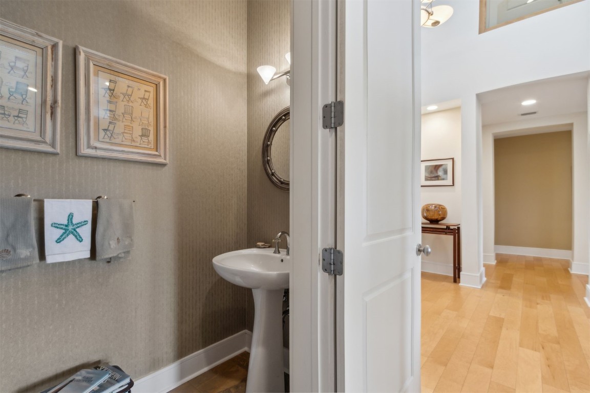 10 Sea Marsh Road Amelia Island, FL 32034 - Photo 13 of 78 a view of a hallway with bathroom and front door