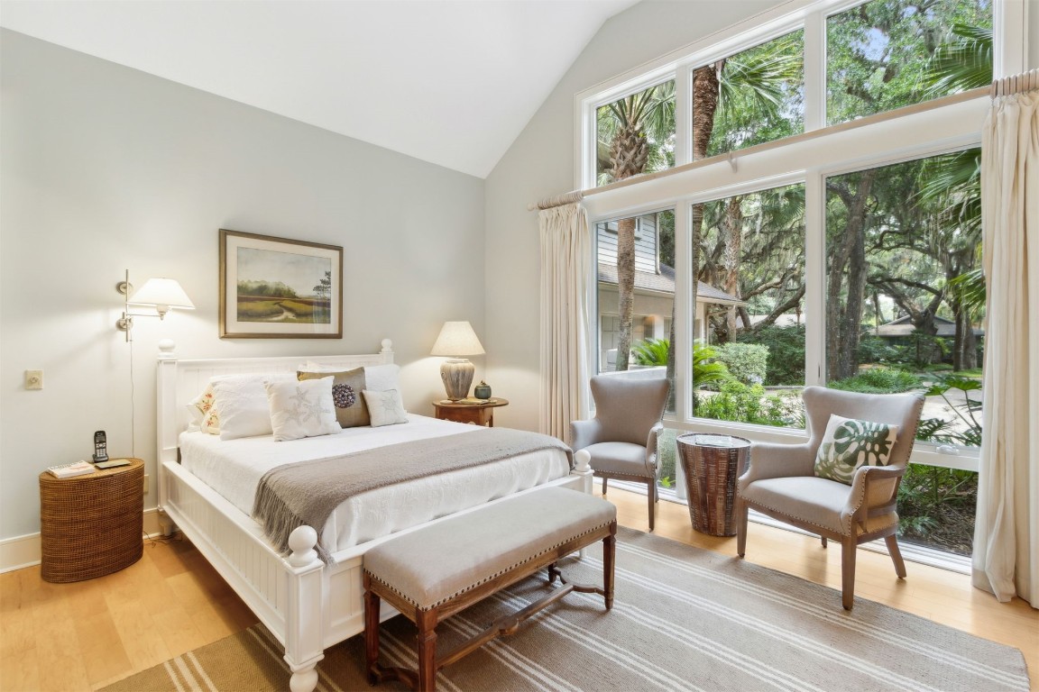 10 Sea Marsh Road Amelia Island, FL 32034 - Photo 20 of 78 a bedroom with a bed and a large window