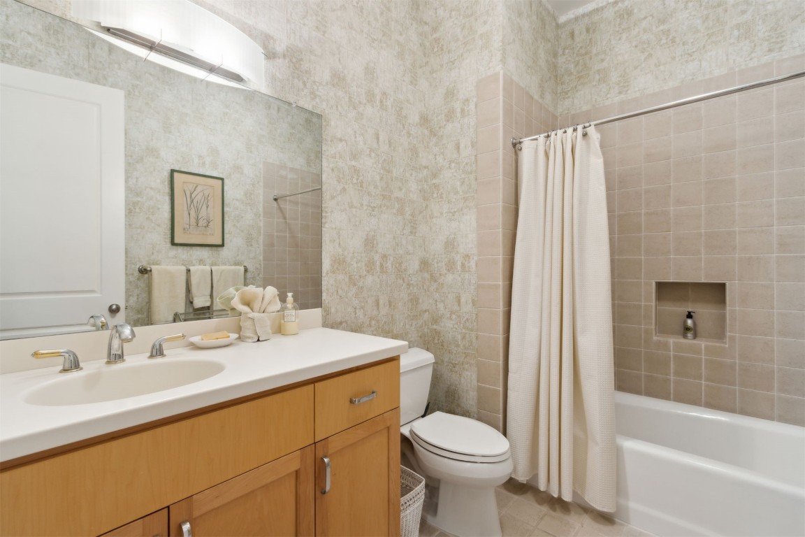 10 Sea Marsh Road Amelia Island, FL 32034 - Photo 22 of 78 a bathroom with a sink toilet and shower