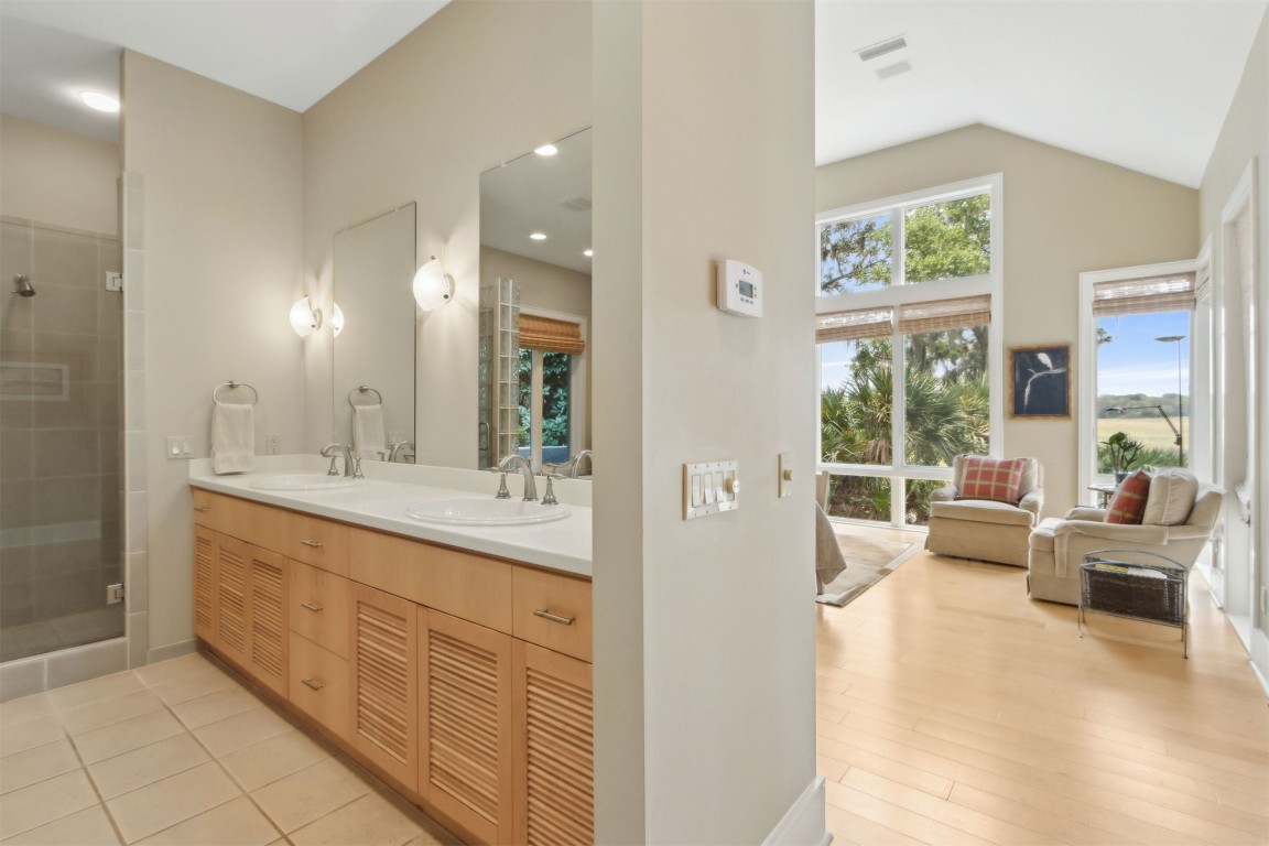 10 Sea Marsh Road Amelia Island, FL 32034 - Photo 29 of 78 a spacious bathroom with a double vanity sink and a large mirror
