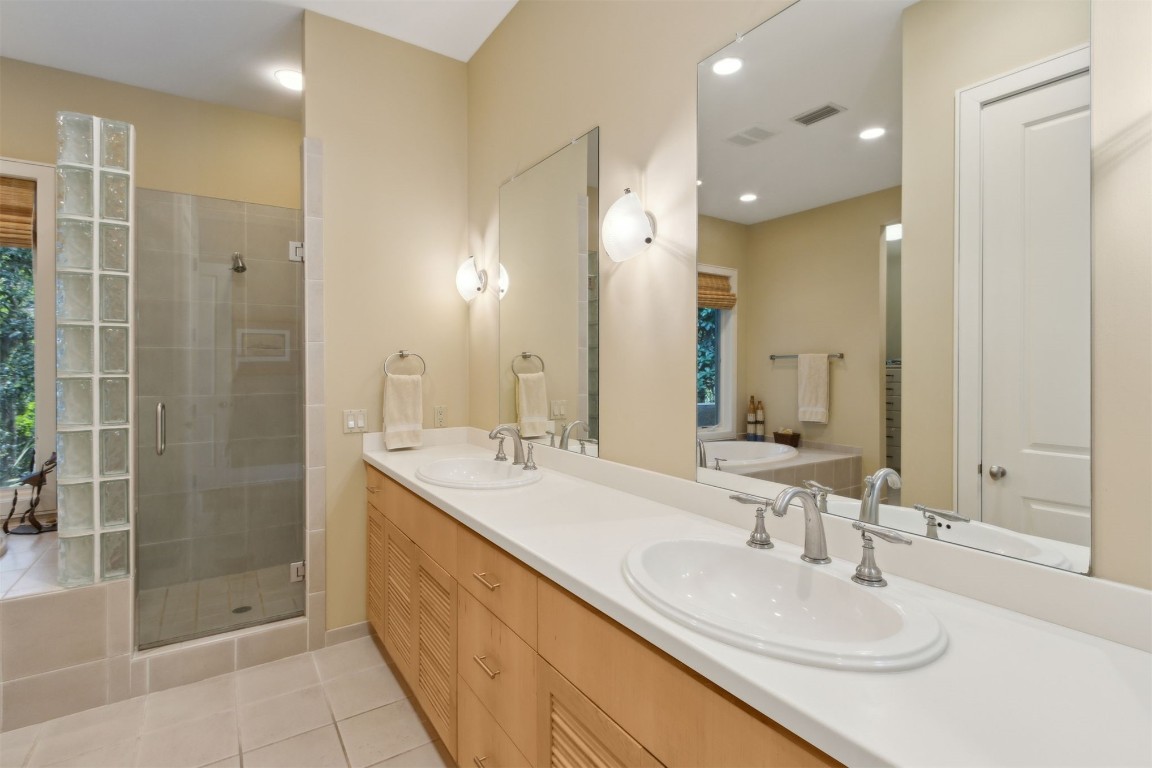 10 Sea Marsh Road Amelia Island, FL 32034 - Photo 30 of 78 a bathroom with a sink double vanity and a mirror