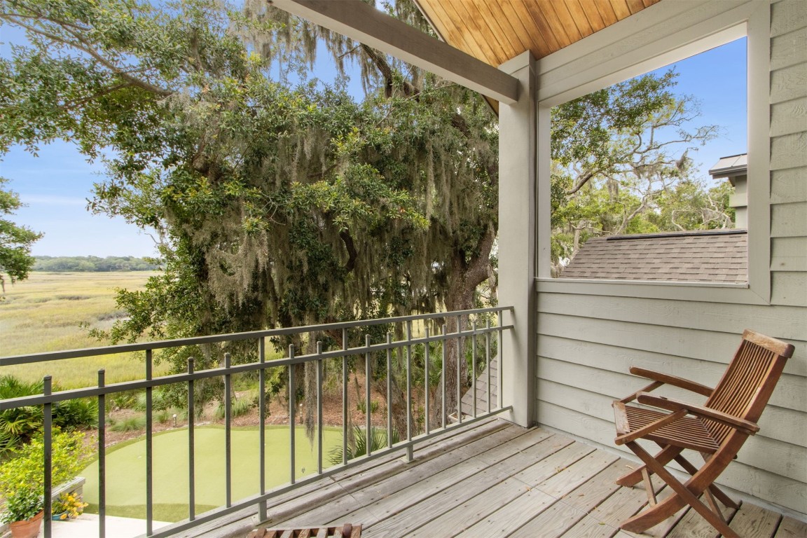 10 Sea Marsh Road Amelia Island, FL 32034 - Photo 36 of 78 a view of a chair and table in the balcony