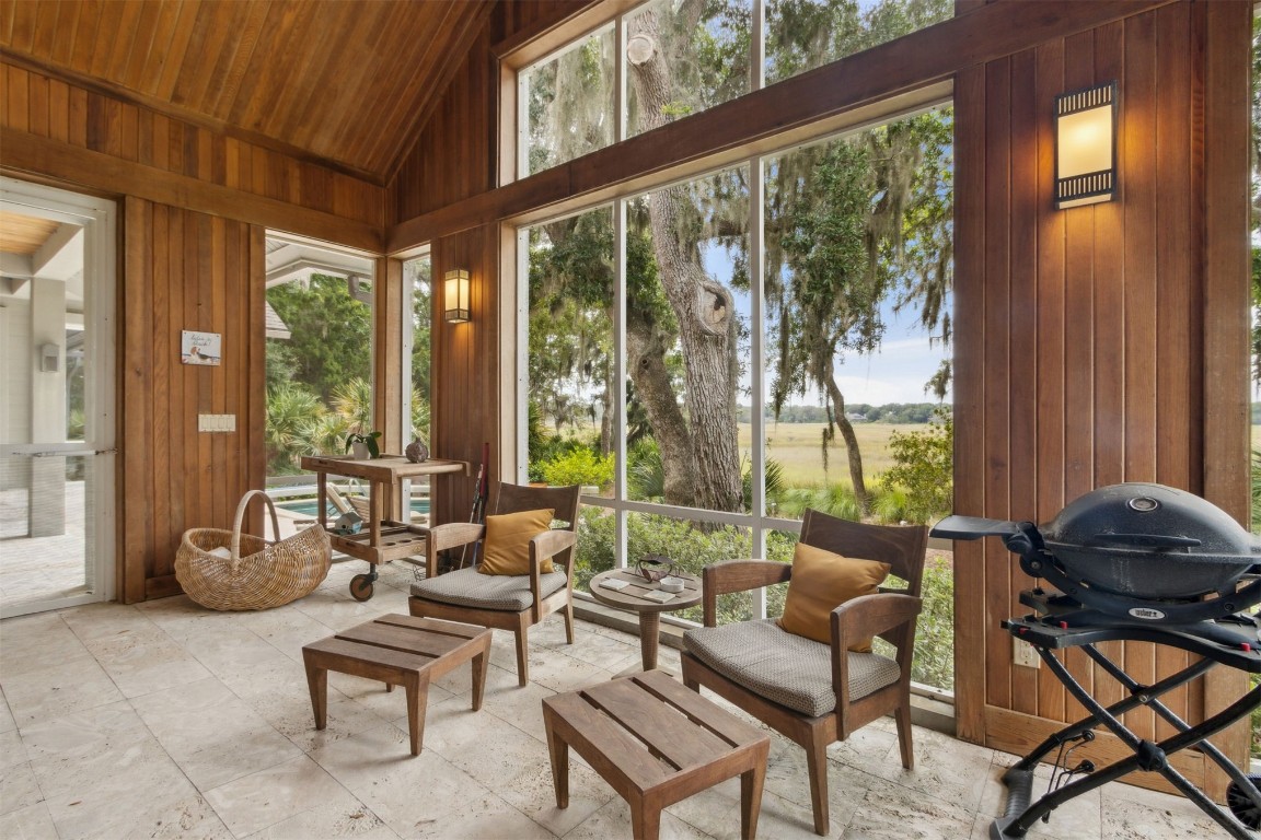 10 Sea Marsh Road Amelia Island, FL 32034 - Photo 38 of 78 a living room with furniture and large windows