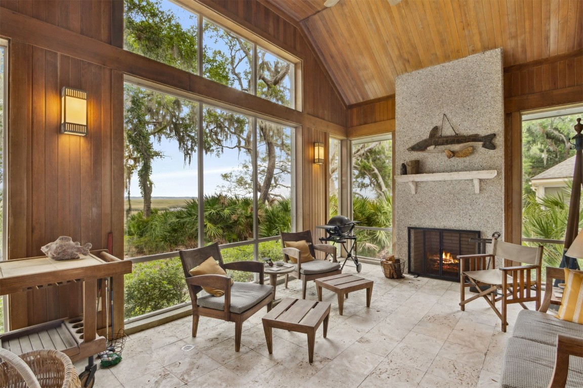 10 Sea Marsh Road Amelia Island, FL 32034 - Photo 39 of 78 a living room with furniture and a fireplace