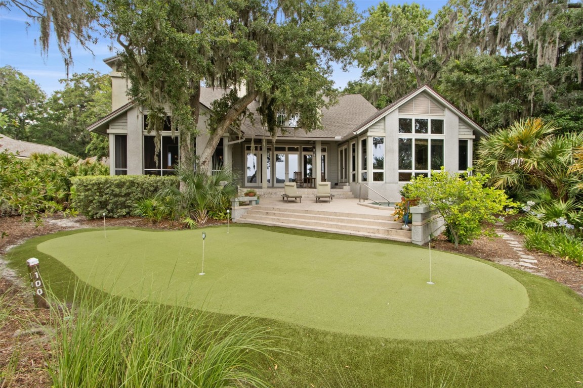 10 Sea Marsh Road Amelia Island, FL 32034 - Photo 47 of 78 a house view with swimming pool and garden space