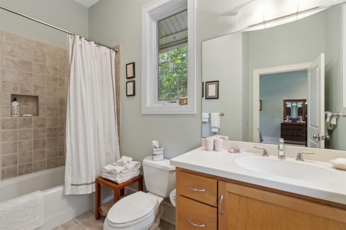 10 Sea Marsh Road Amelia Island, FL 32034 - Photo 55 of 78 a bathroom with a sink toilet and shower