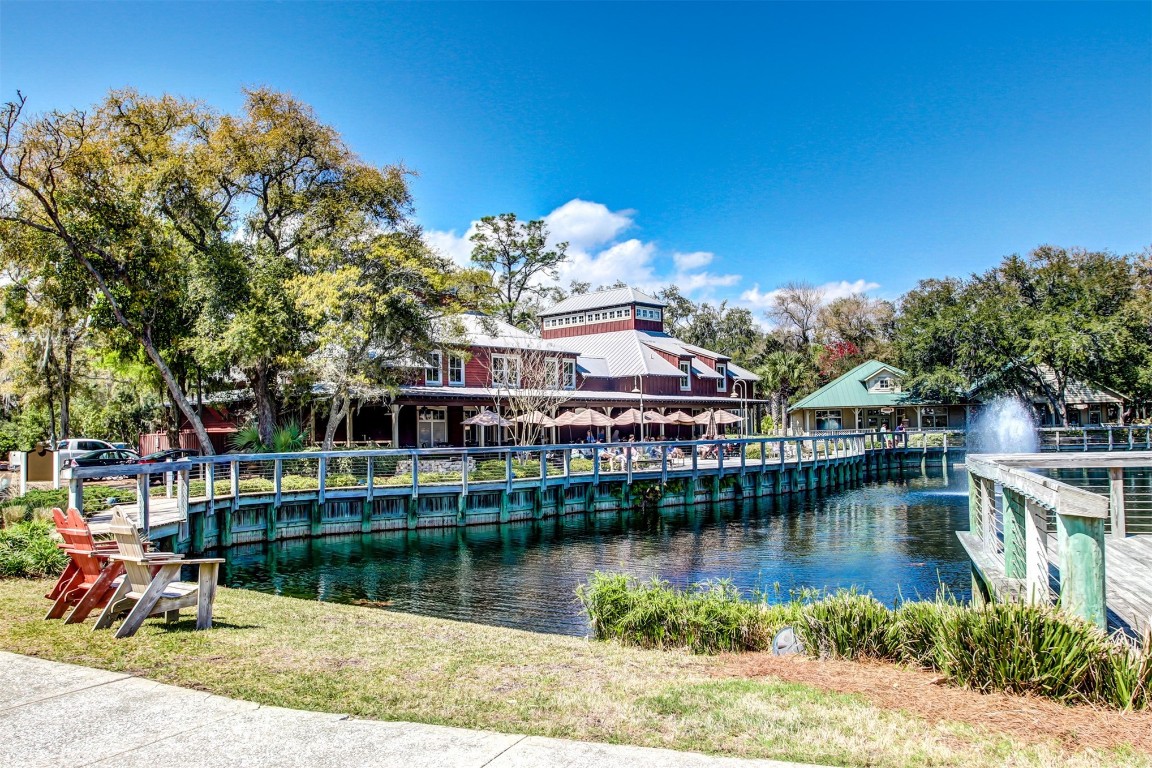 10 Sea Marsh Road Amelia Island, FL 32034 - Photo 61 of 78 a view of a lake with a house in the background