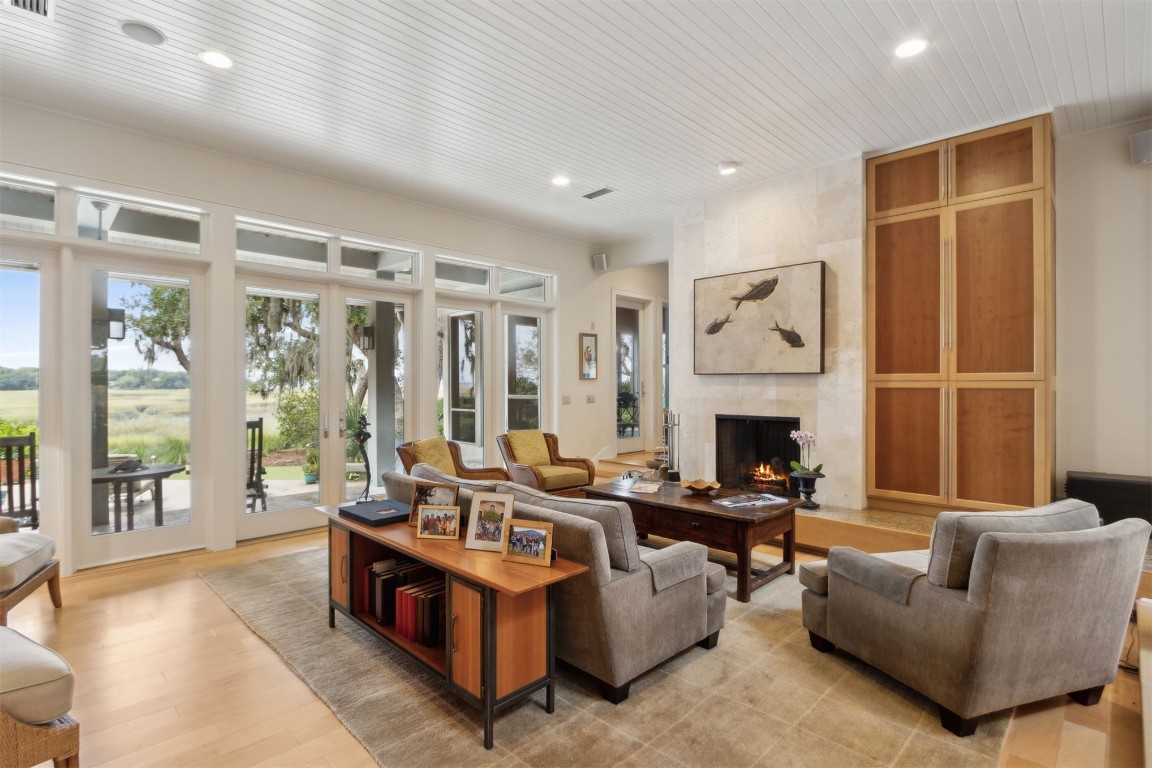 10 Sea Marsh Road Amelia Island, FL 32034 - Photo 8 of 78 a living room with furniture large window and a fireplace