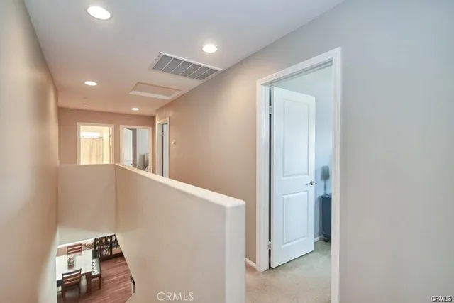 a view of livingroom with hardwood floor and hallway