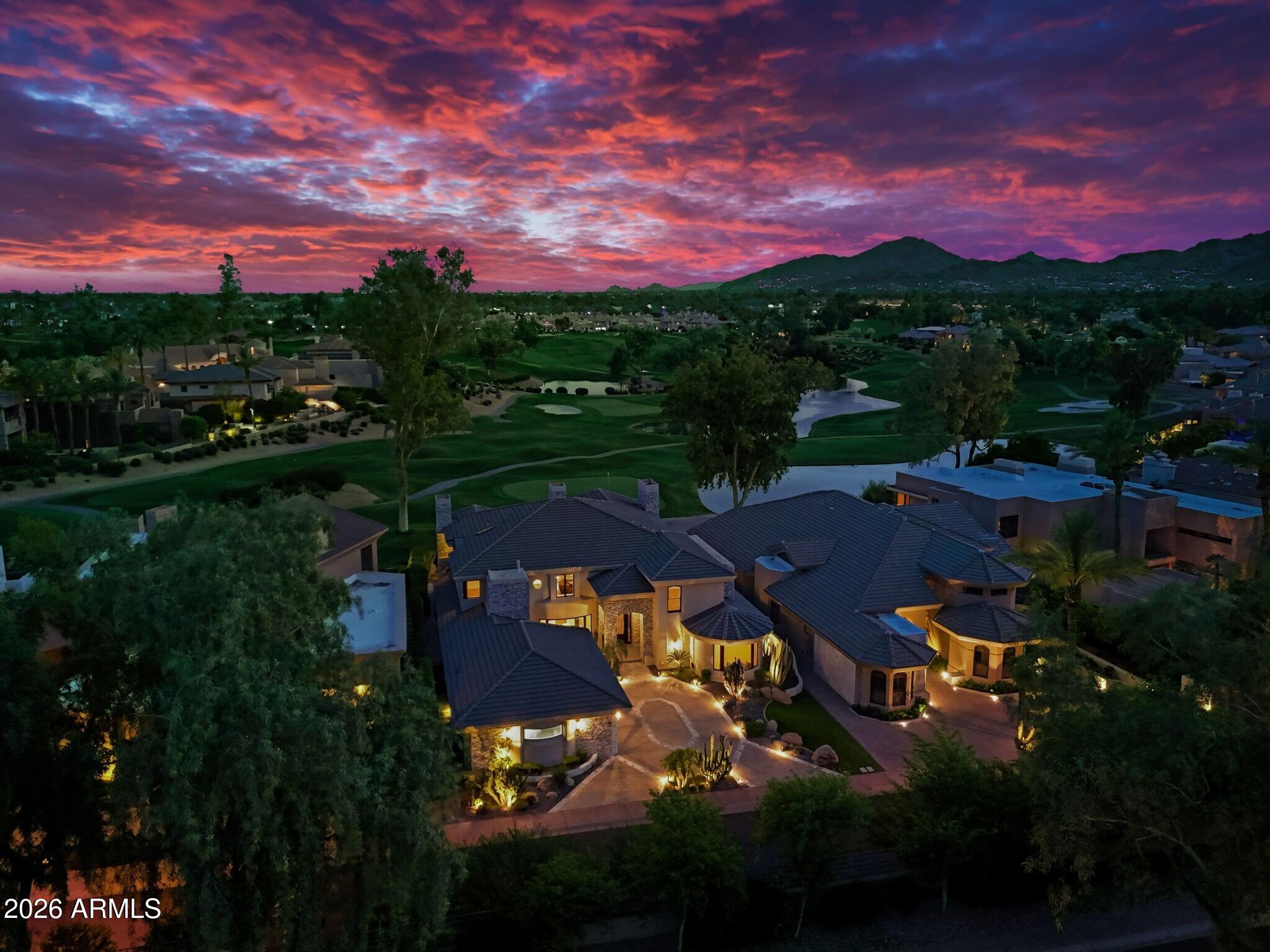 7475 East Gainey Ranch Road, Unit 7 Scottsdale, AZ 85258 - Photo 1 of 77 001_Twilight Aerial View