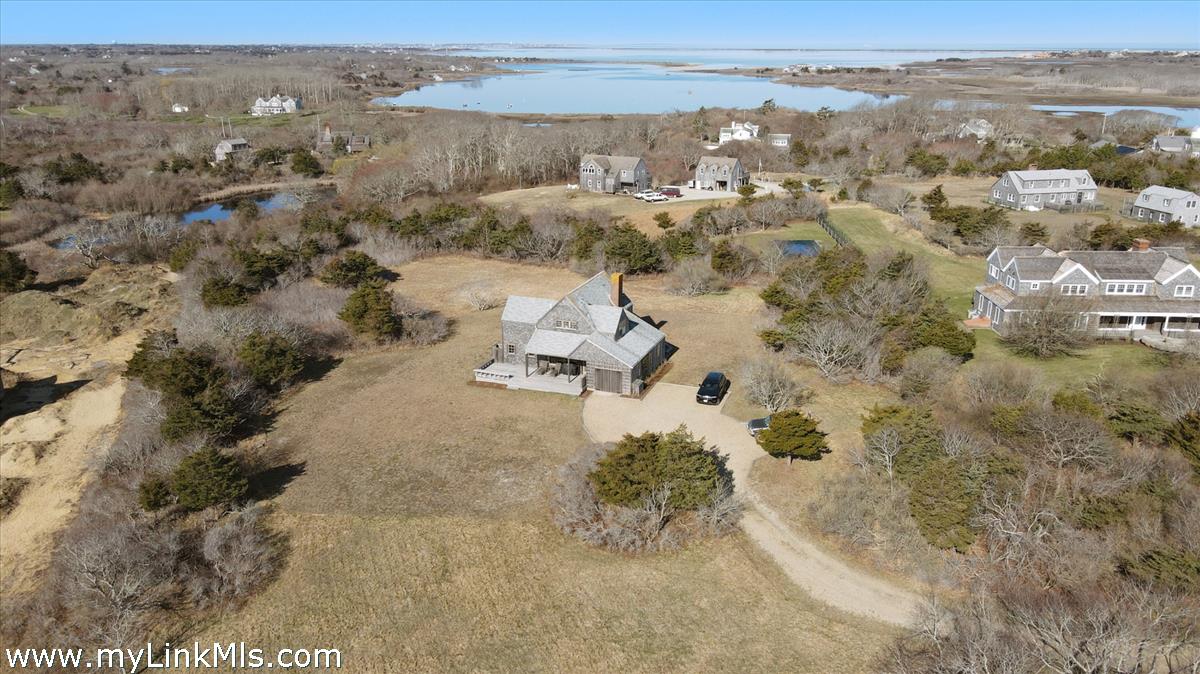 13 Eat Fire Spring Road Nantucket, MA 02554 - Photo 4 of 43 an aerial view of houses with yard