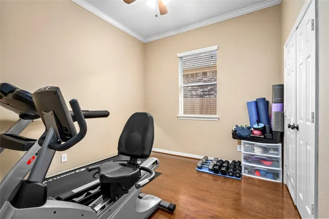 a room with furniture and gym equipment
