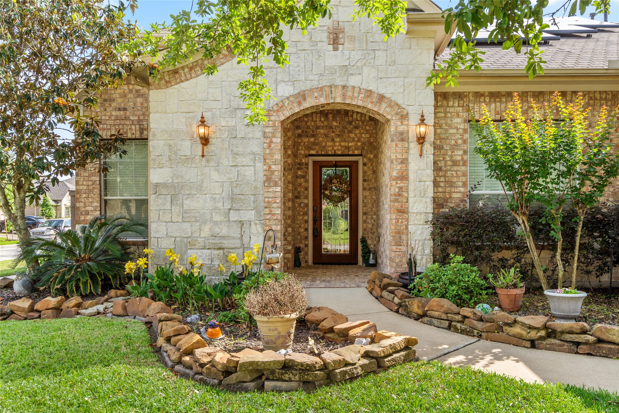 517 West Fork Webster, TX 77598 - Photo 2 of 28 a front view of a house with garden