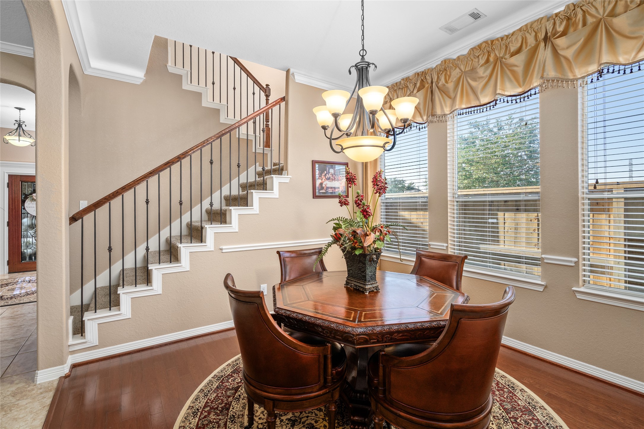 517 West Fork Webster, TX 77598 - Photo 21 of 28 a view of a dining room with furniture window and wooden floor