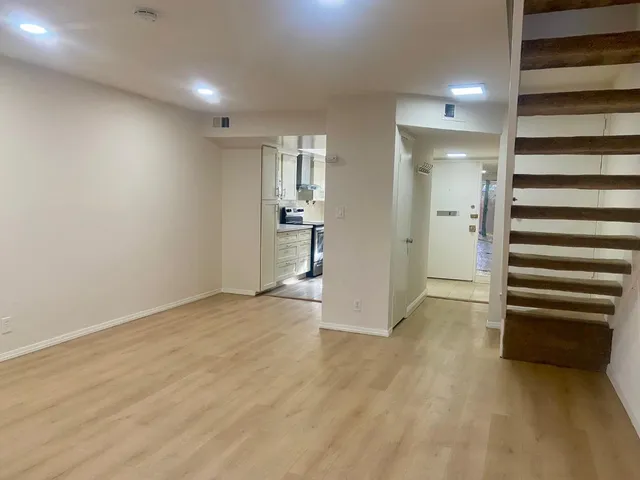 a bathroom with a sink a toilet and a bathtub