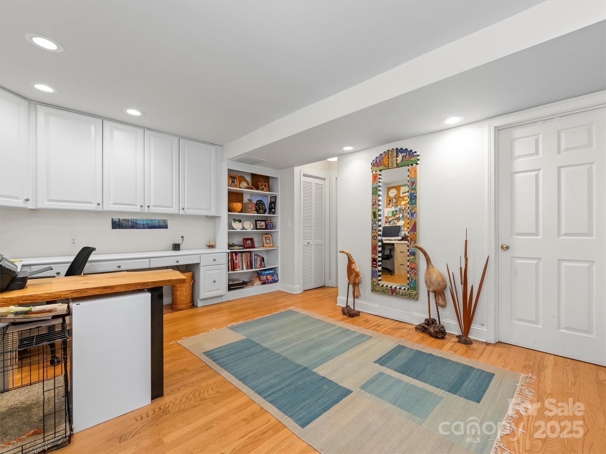 7 Park Road Asheville, NC 28803 - Photo 20 of 48 a kitchen with stainless steel appliances granite countertop a refrigerator sink and cabinets