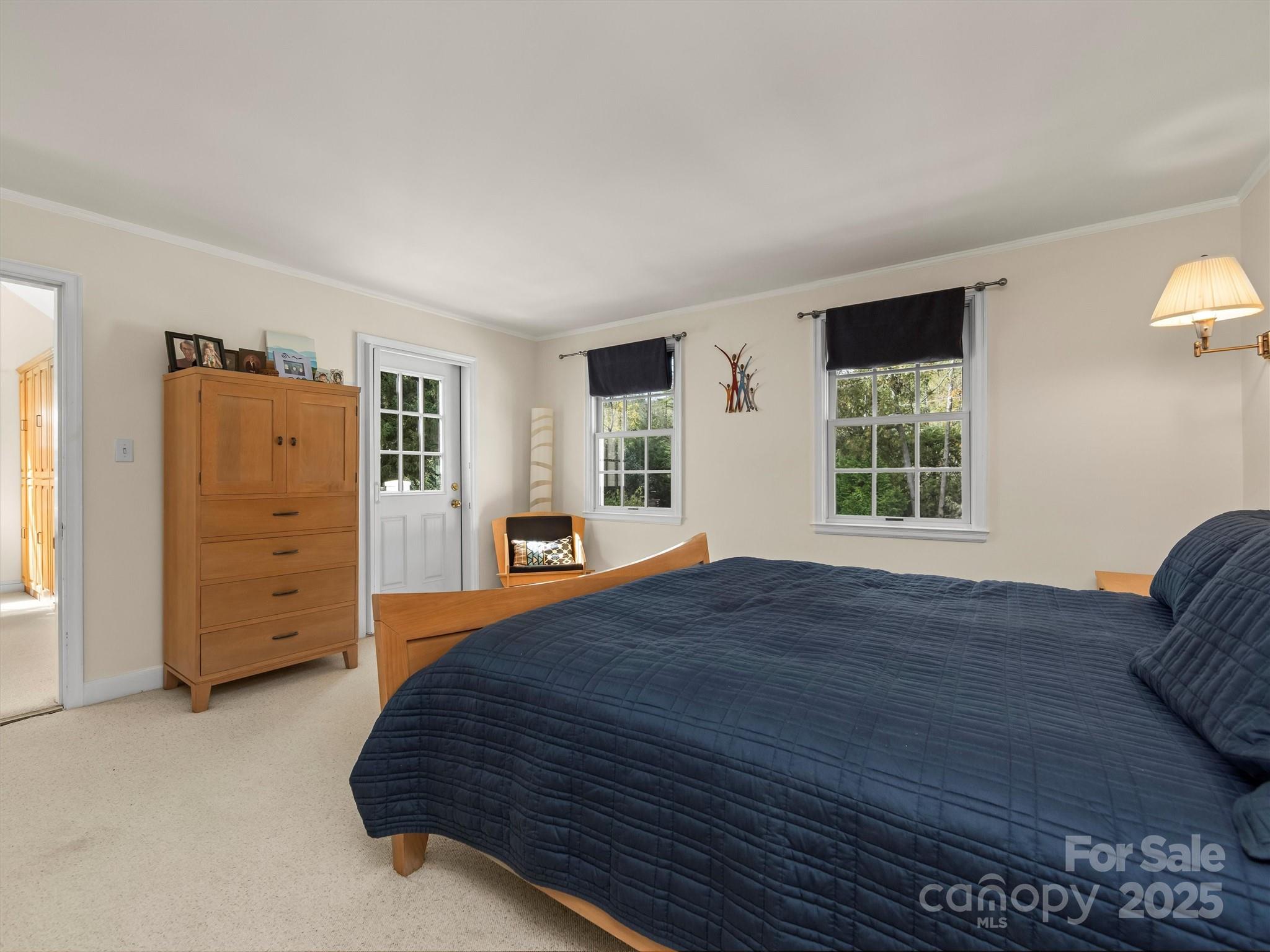 7 Park Road Asheville, NC 28803 - Photo 26 of 48 a bedroom with a bed and a closet