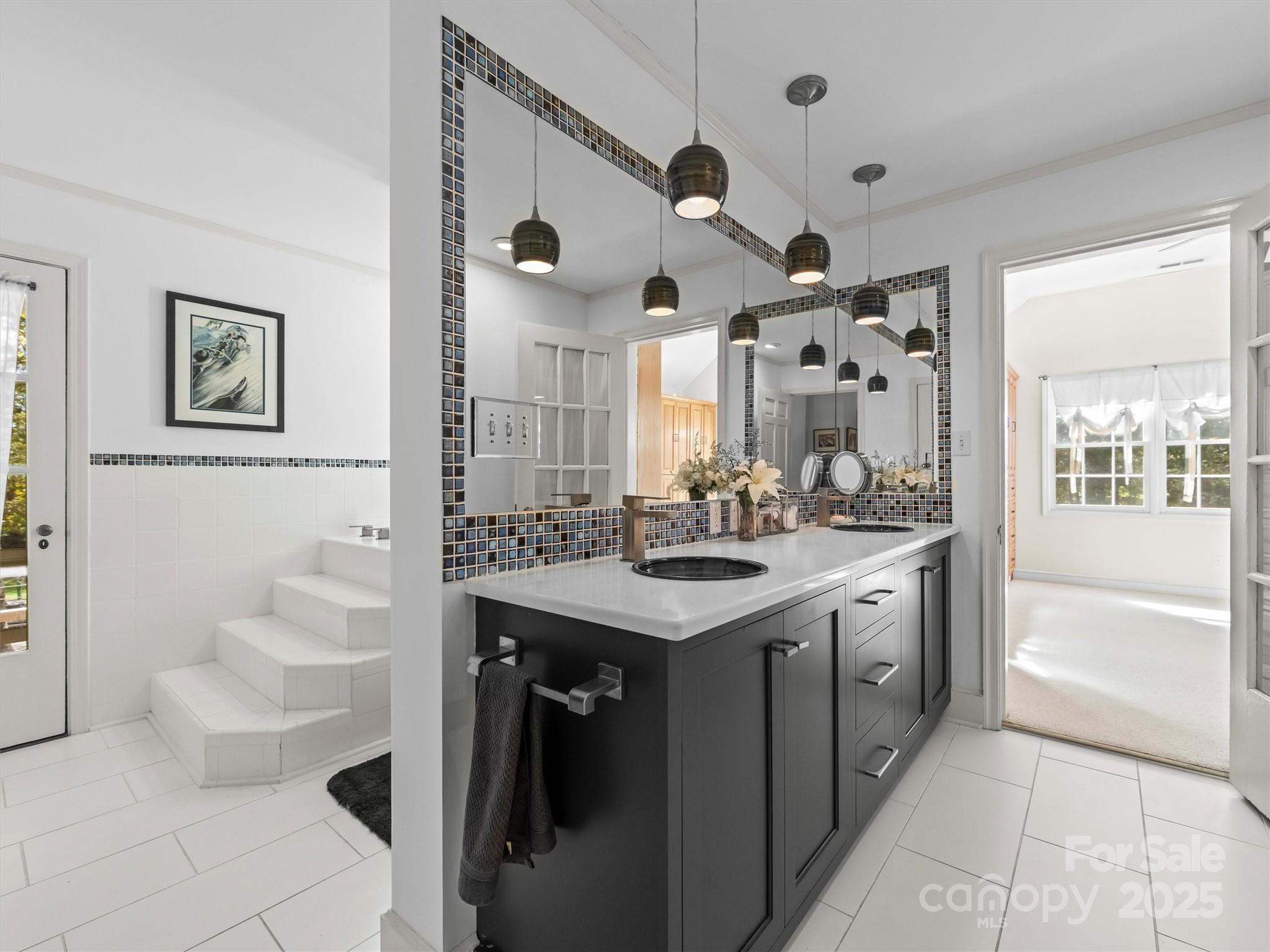 7 Park Road Asheville, NC 28803 - Photo 27 of 48 a bathroom with a sink a vanity and a mirror