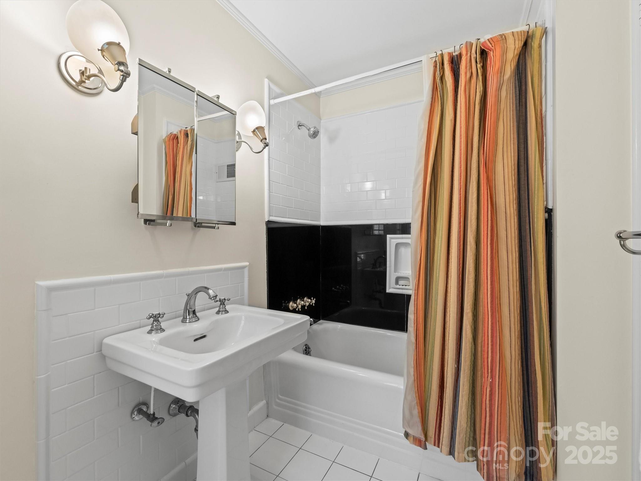 7 Park Road Asheville, NC 28803 - Photo 30 of 48 a bathroom with a sink and a bathtub