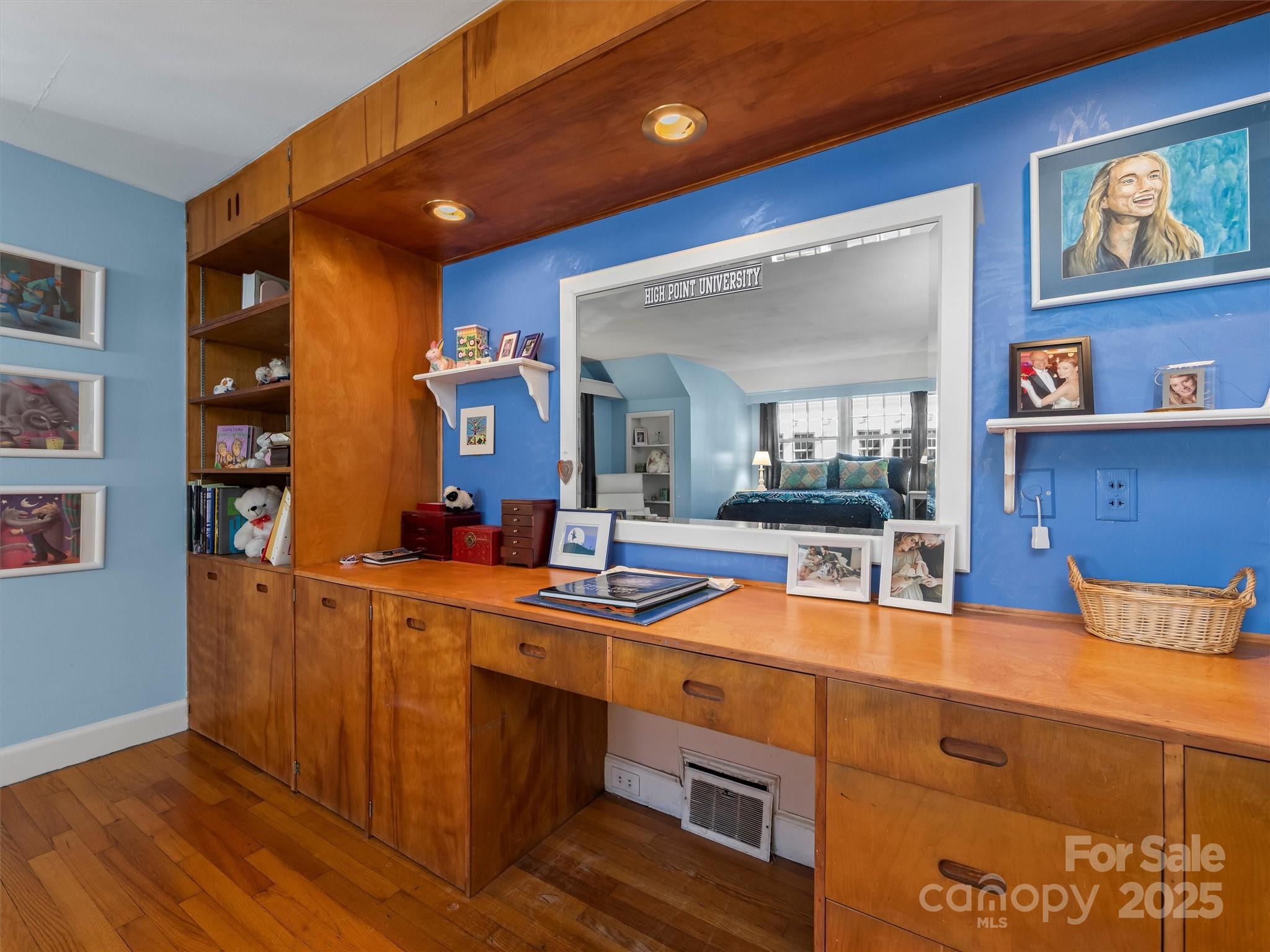 7 Park Road Asheville, NC 28803 - Photo 37 of 48 a room with furniture and wooden floor