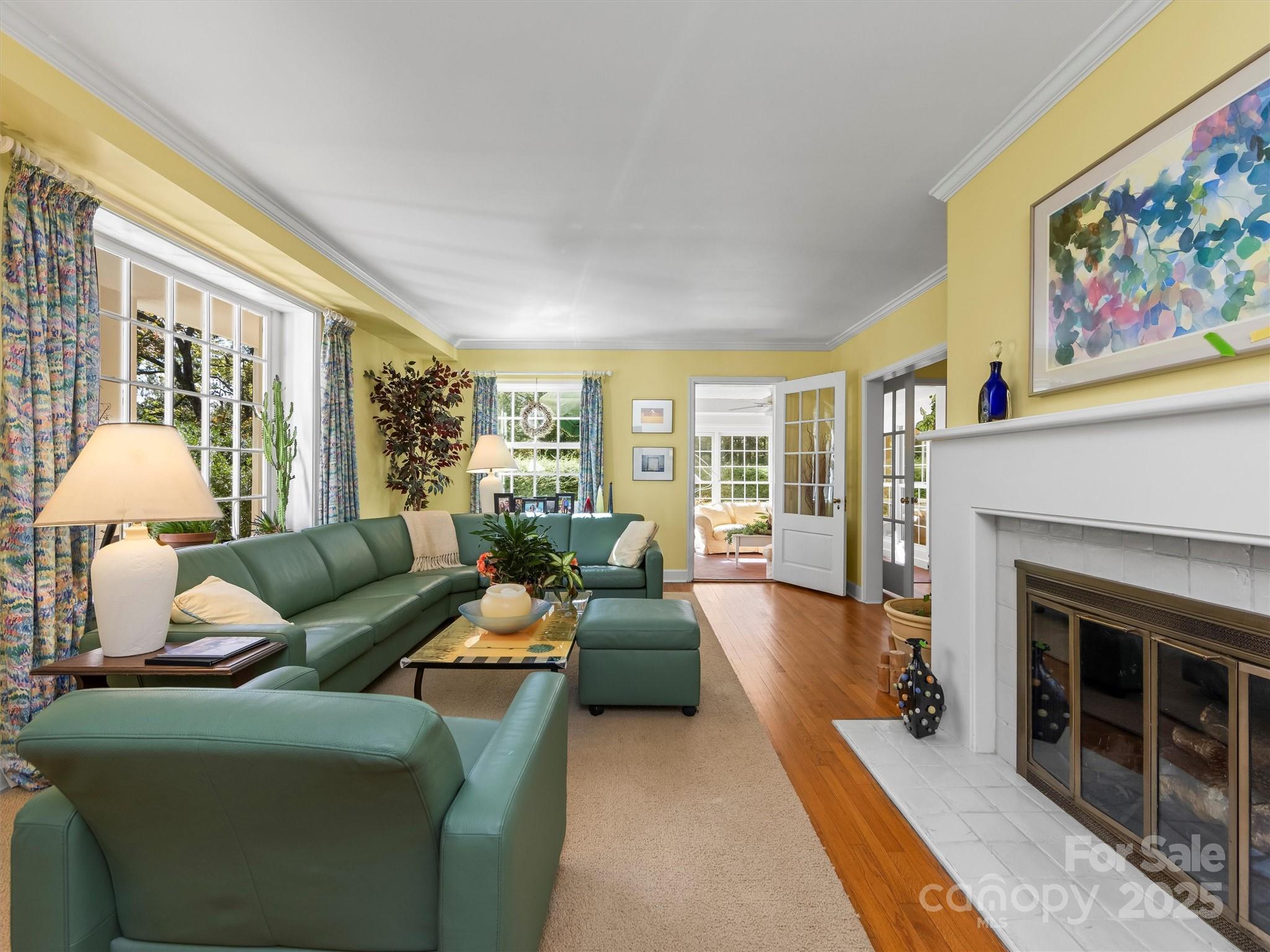 7 Park Road Asheville, NC 28803 - Photo 5 of 48 a living room with furniture and a fireplace