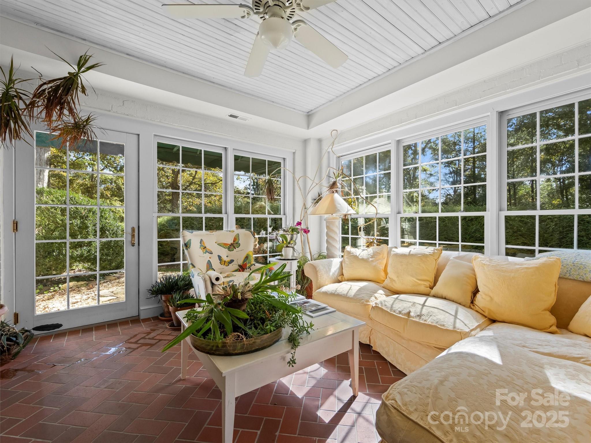 7 Park Road Asheville, NC 28803 - Photo 8 of 48 a living room filled with furniture and a large window