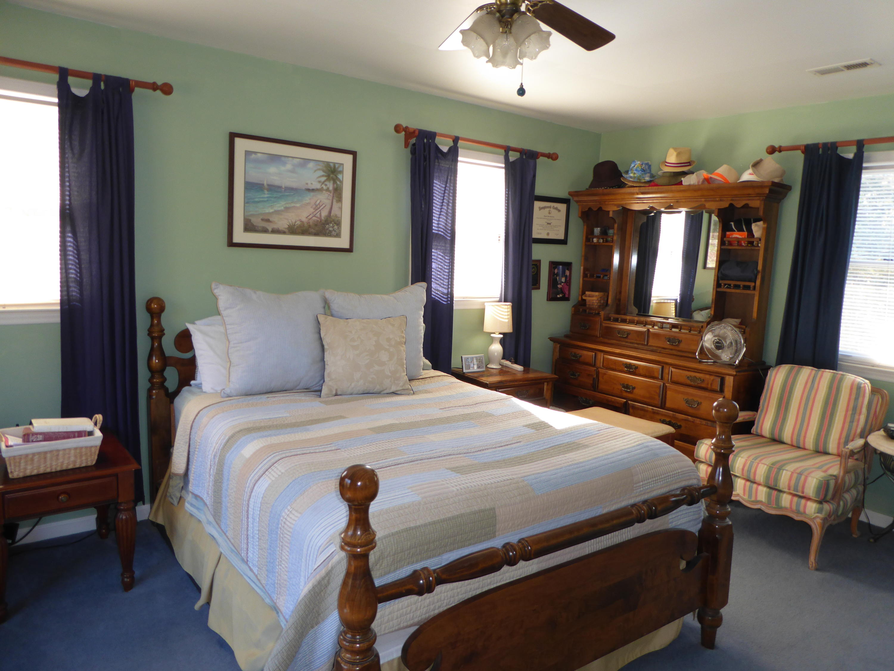 130 Highland Lake Road Union Hall, VA 24176 - Photo 22 of 33 a bedroom with a bed and wooden floor